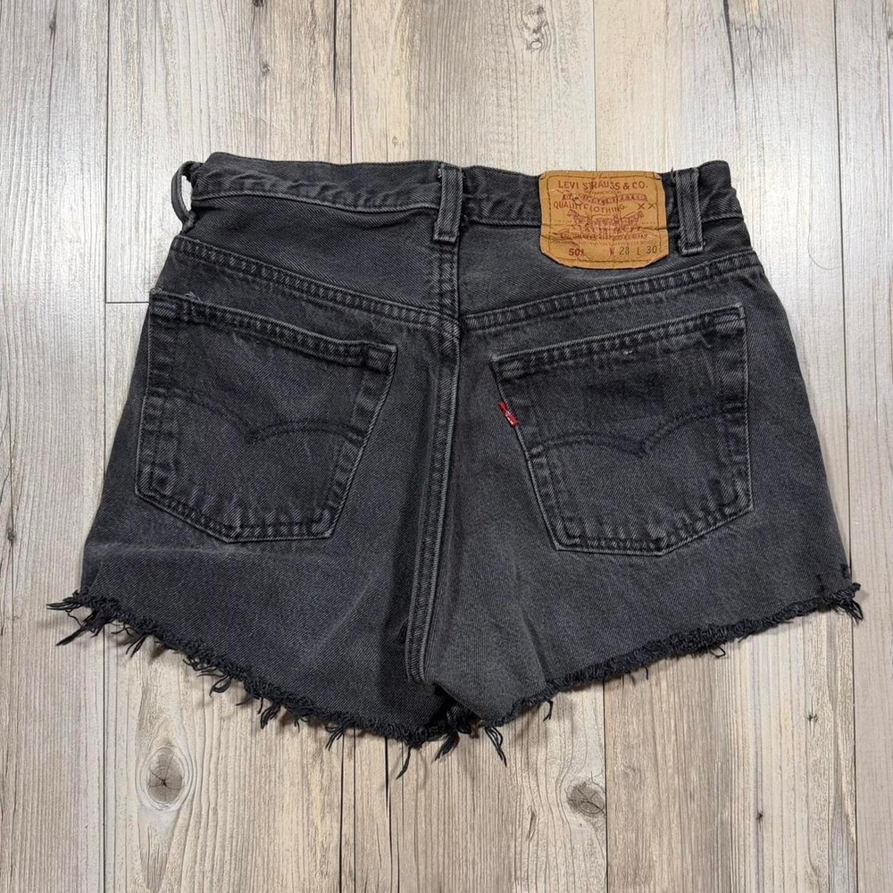 Levi's black denim thrashed shorts with frayed hem